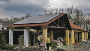 Carport for cars with solar panels on the roof